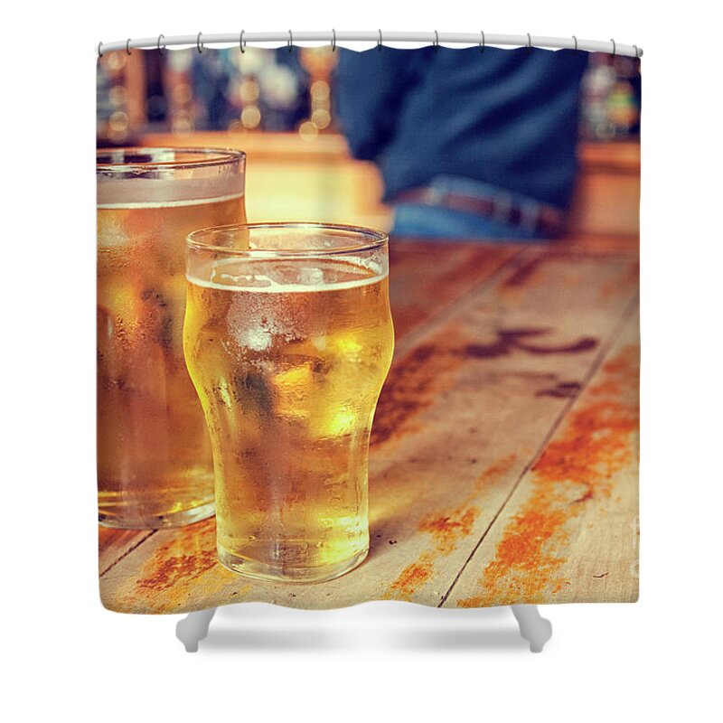 Alcohol Shower Curtain featuring the photograph Beers in a pub by Patricia Hofmeester