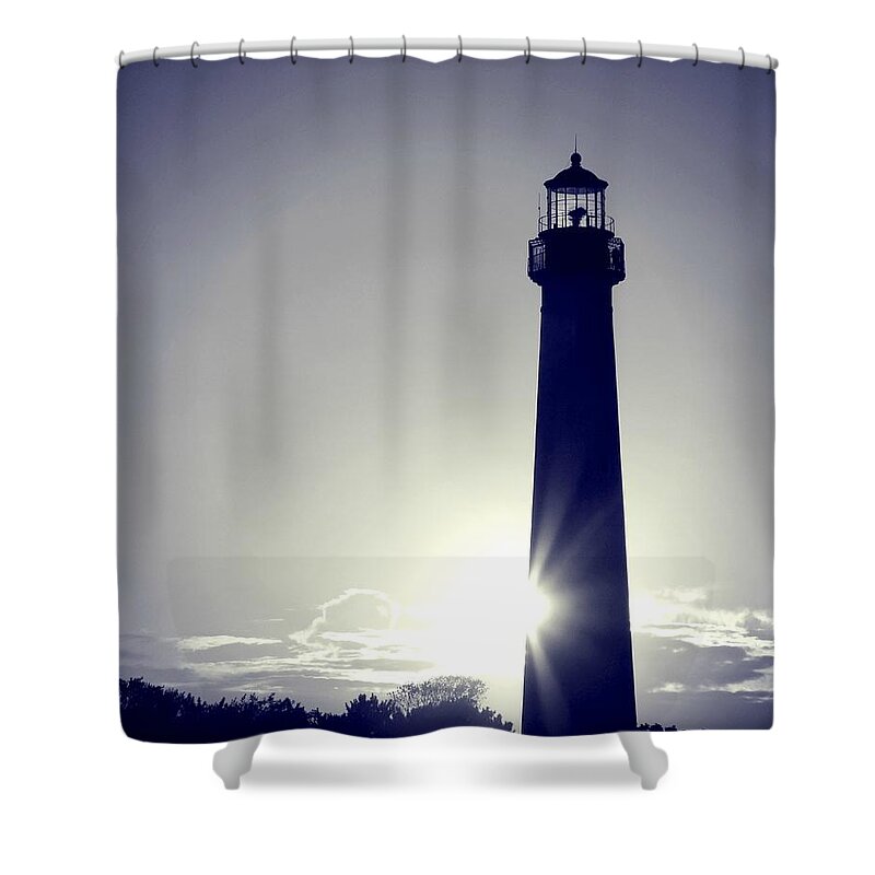 Blue Lighthouse Silhouette Shower Curtain featuring the photograph Blue Lighthouse Silhouette by Dark Whimsy