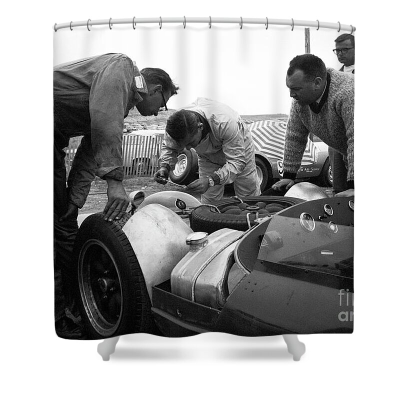 Can-am Shower Curtain featuring the photograph Bruce Mclaren working with Crew in pit at Laguna Seca by Robert K Blaisdell