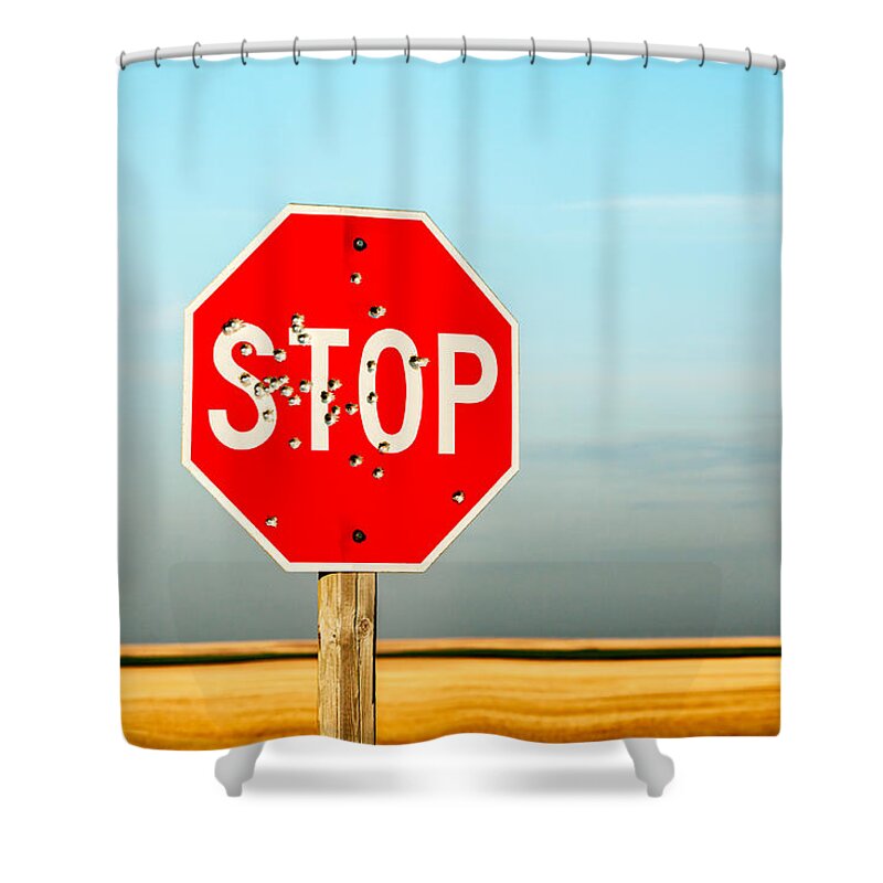 Stop Sign Shower Curtain featuring the photograph Bullet Riddled by Todd Klassy