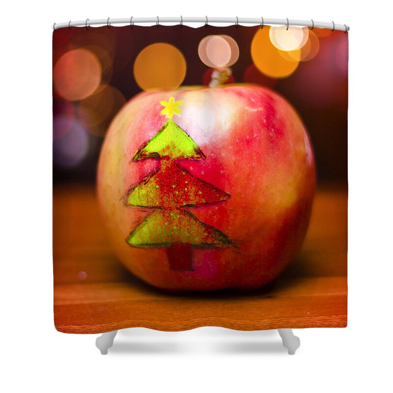Christmas Shower Curtain featuring the photograph Christmas tree painted on apple decoration by Jorgo Photography