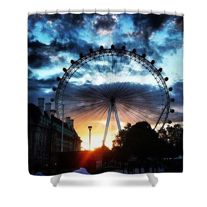 Wheel Shower Curtain featuring the photograph Circling The Sunset by Louise McAulay