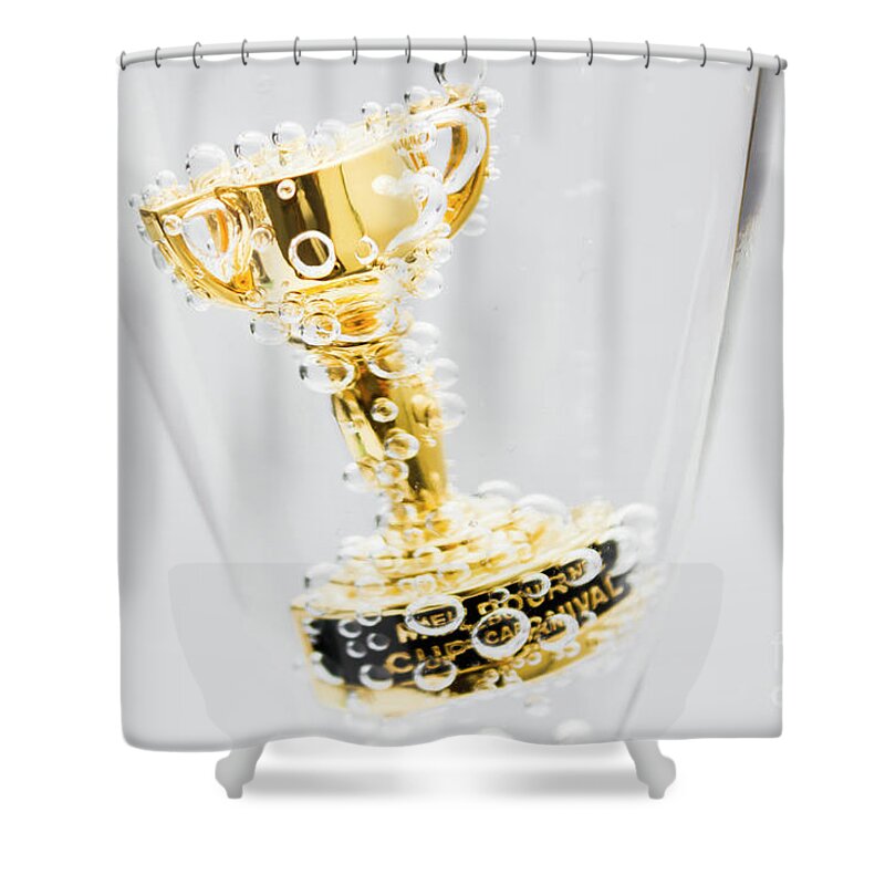 Horse Shower Curtain featuring the photograph Closeup of small trophy in champagne flute. Gold colored award i by Jorgo Photography