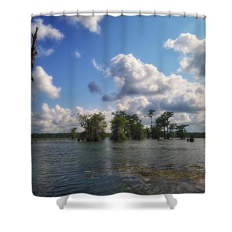 Clouds Shower Curtain featuring the photograph Clouds over the Louisiana bayou by Mary Capriole