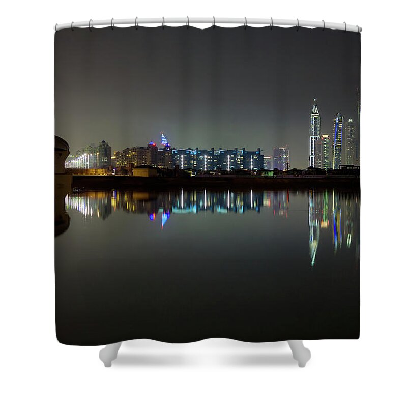 Dubai Shower Curtain featuring the photograph Dubai city skyline night time reflection by Andy Myatt