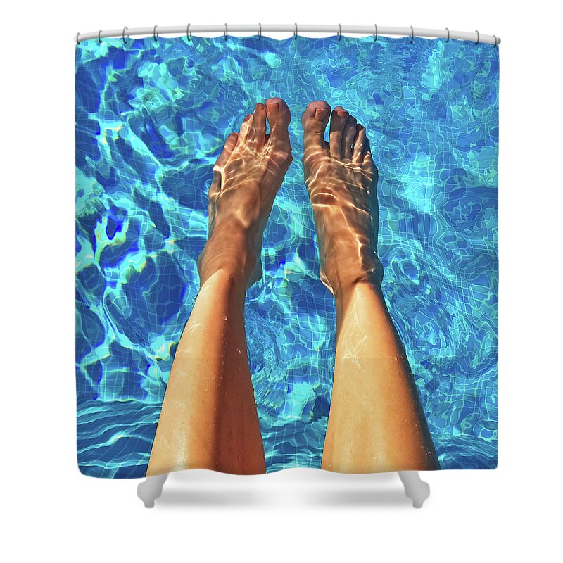 Foot Shower Curtain featuring the photograph Female feet in blue water by GoodMood Art