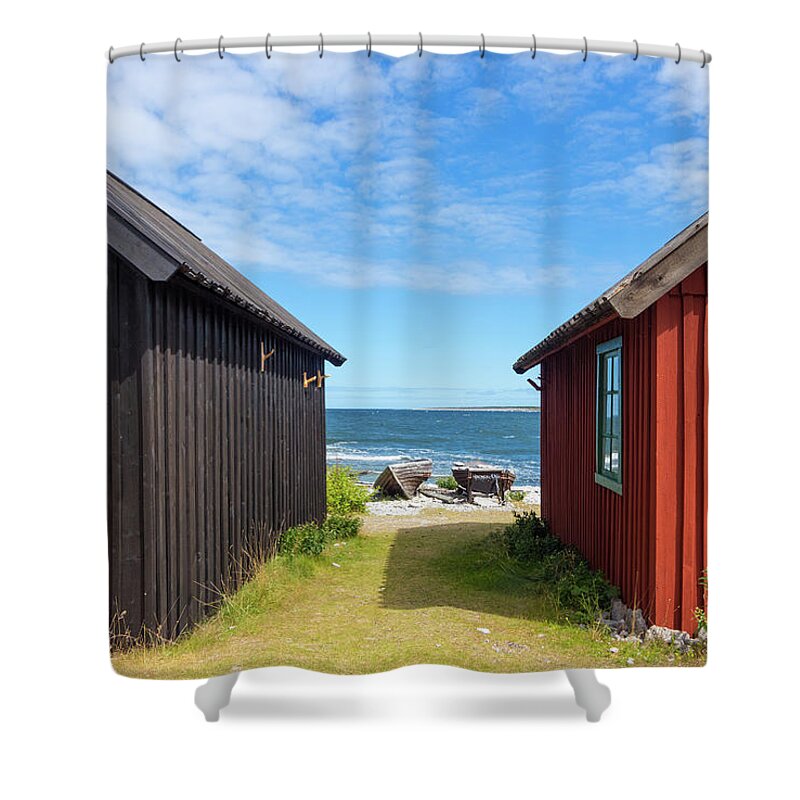Sea Shower Curtain featuring the photograph Fishing village on Faro island, Sweden by GoodMood Art