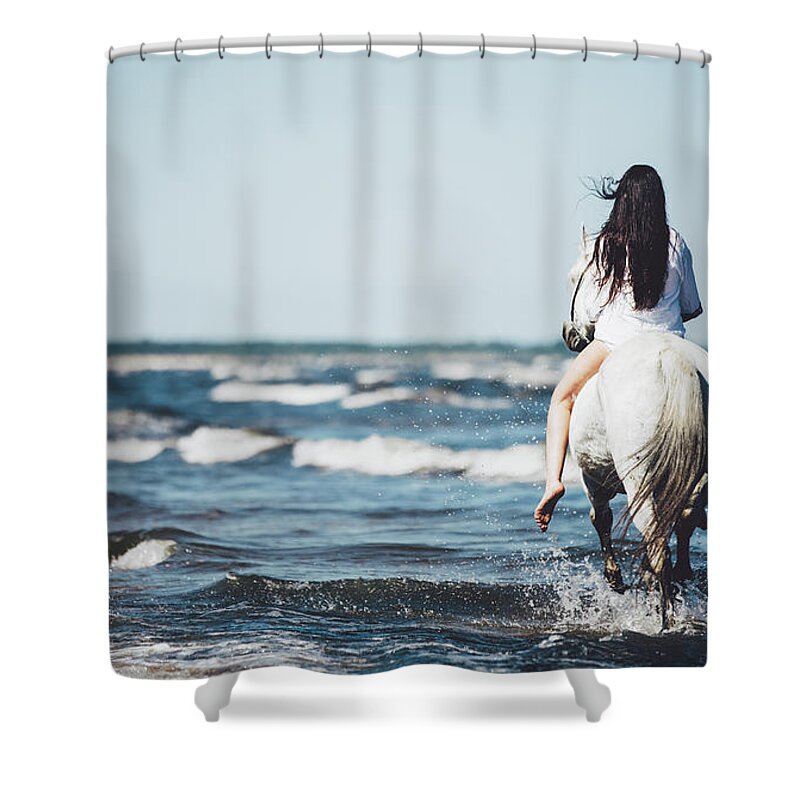 Woman Shower Curtain featuring the photograph Girl riding on the white stallion in the sea. by Michal Bednarek