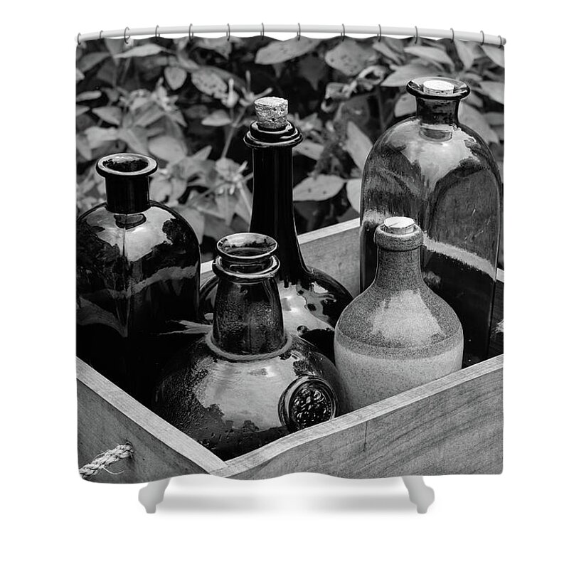 Antique Shower Curtain featuring the photograph Glass Bottles in the Garden by Nicole Lloyd
