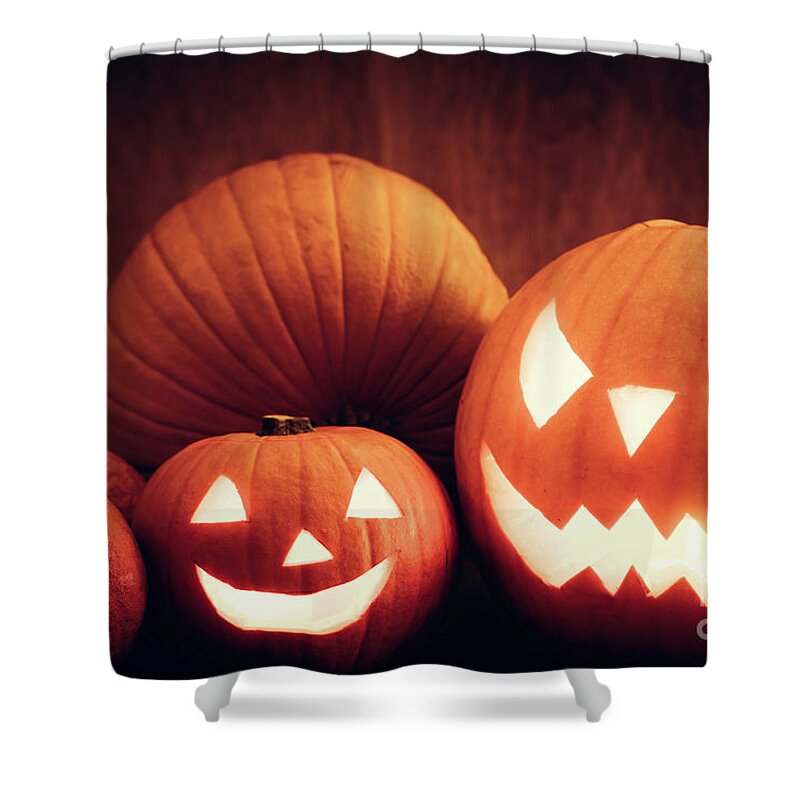 Halloween Shower Curtain featuring the photograph Halloween pumpkins glowing, jack-o-lantern by Michal Bednarek