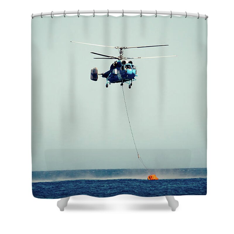 Aerospace Shower Curtain featuring the photograph Helicopter firefighter take water in the sea by Raimond Klavins