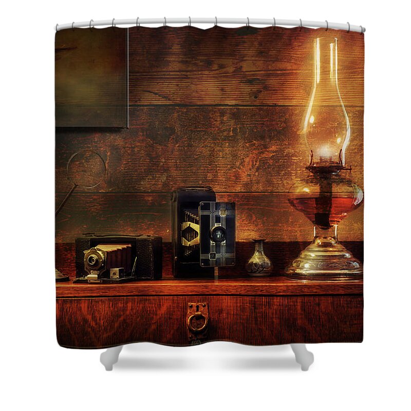 Cameras Shower Curtain featuring the photograph Lamplight by John Anderson
