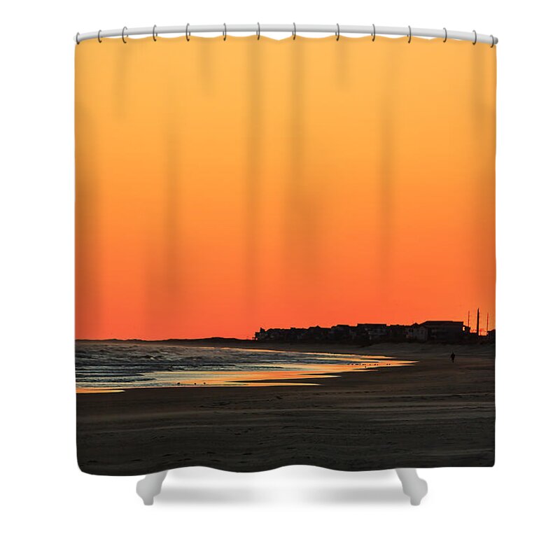 Nags Head Shower Curtain featuring the photograph Lone runner at sunset by Joni Eskridge