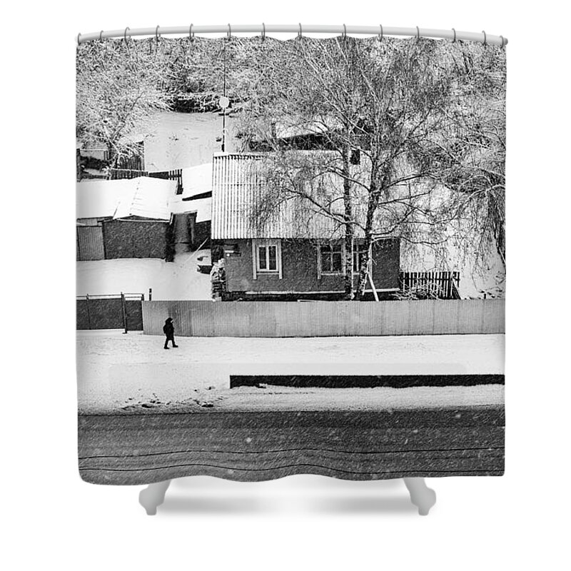 Lone Shower Curtain featuring the photograph Lone Walker and the Snow Fall Village by John Williams