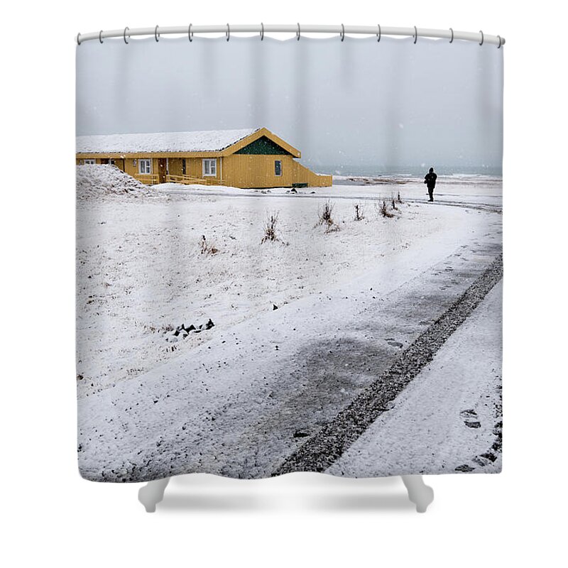 Iceland Shower Curtain featuring the photograph Man walking in snow Iceland by Michalakis Ppalis