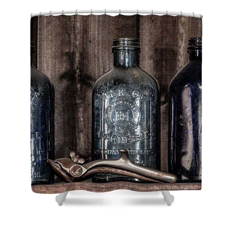 Old Shower Curtain featuring the photograph Milk of Magnesia Bottles by Teresa Wilson