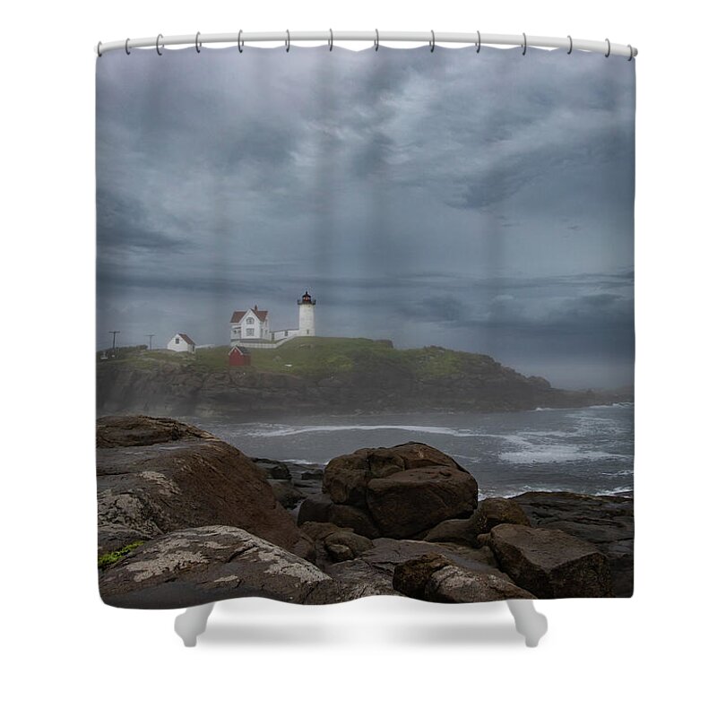 Nubble Lighthouse Shower Curtain featuring the photograph Nubble Lighthouse with Overcast Moody Sky by Michael Saunders