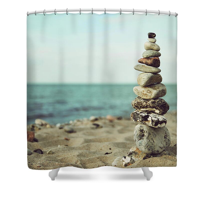 Stones Shower Curtain featuring the photograph Poised by Hannes Cmarits