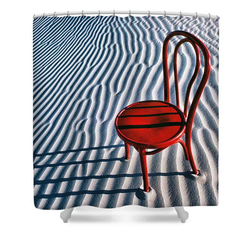 Red Shower Curtain featuring the photograph Red chair in sand by Garry Gay
