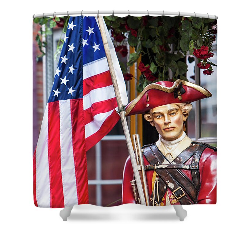 Boston Shower Curtain featuring the photograph Red Coat holding the American flag by Jason Hughes
