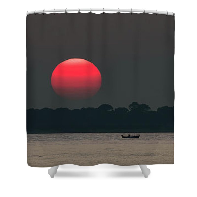 Sun Shower Curtain featuring the photograph Red Sun at Sunset at Sea with Fishing Boat by Andreas Berthold