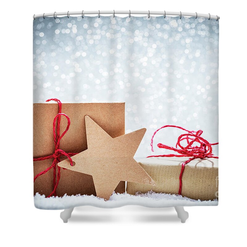 Present Shower Curtain featuring the photograph Retro rustic Christmas gifts, presents in snow on glitter background by Michal Bednarek