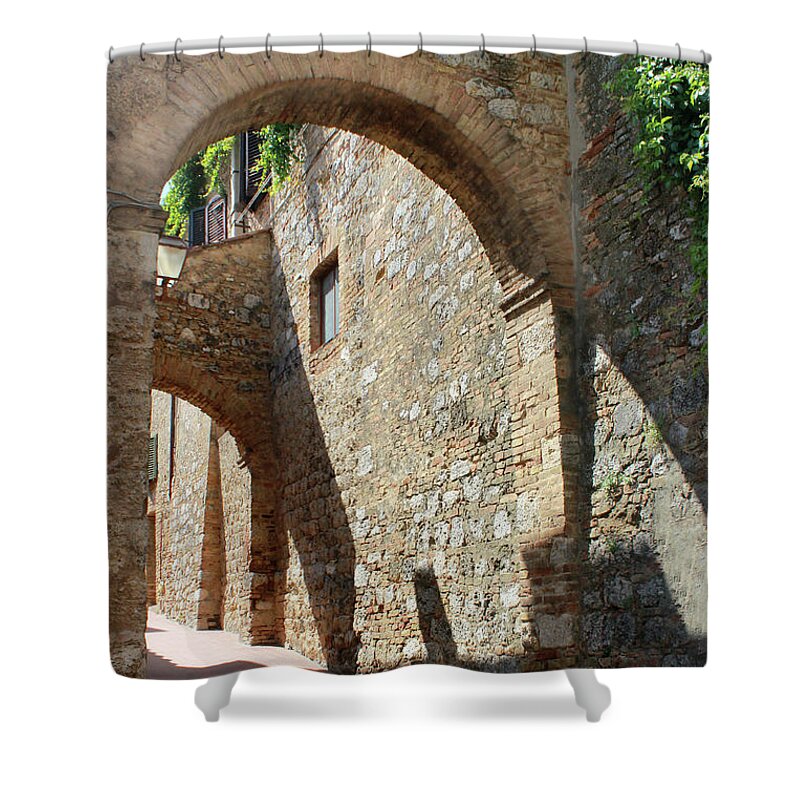 Italy Shower Curtain featuring the photograph San Gimignano Arched street in Italy by Adam Long