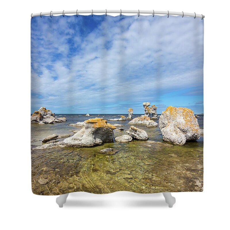 Sea Shower Curtain featuring the photograph Sea stacks on the East coast of Sweden by GoodMood Art