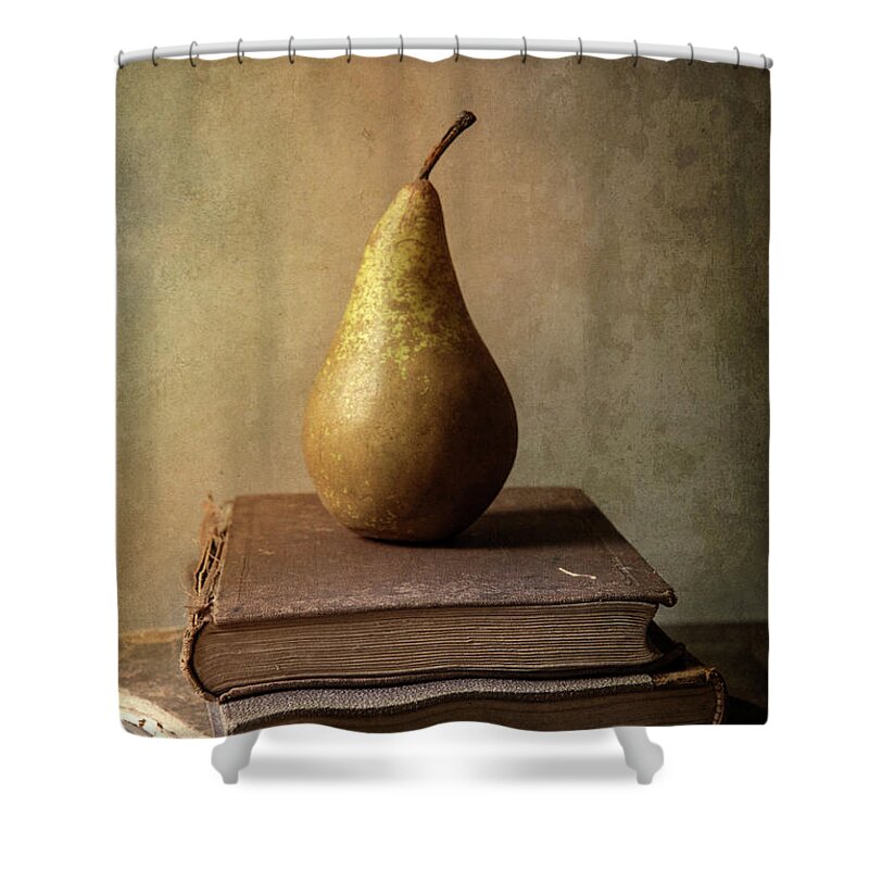Book Shower Curtain featuring the photograph Still life with old books and fresh pear by Jaroslaw Blaminsky