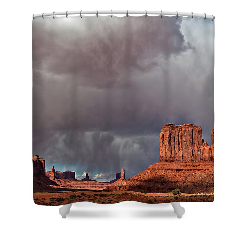 Desert Shower Curtain featuring the photograph Storm over Monument Valley by Wesley Aston