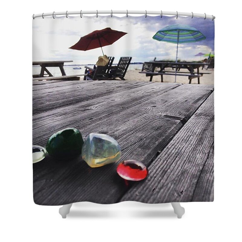 Beach Shower Curtain featuring the photograph Table Stones And Beach Umbrellas by Heather Classen