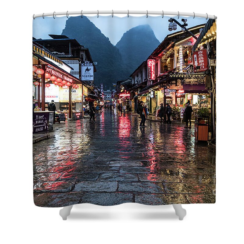 China Shower Curtain featuring the photograph The famous West street in Yangshuo near Guilin in south China by Didier Marti