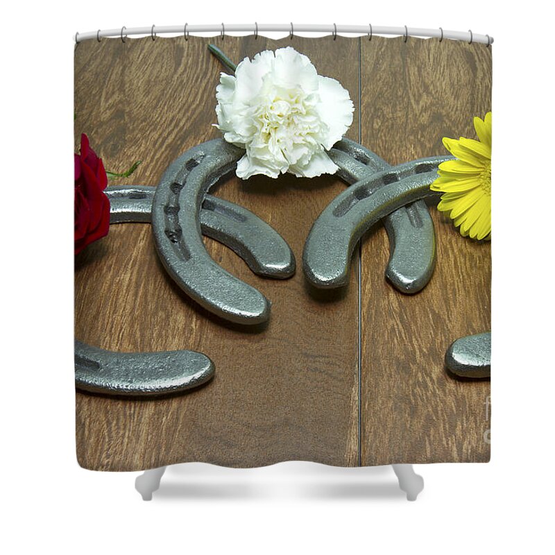 Triple Crown Shower Curtain featuring the photograph Triple Crown Flowers on Horseshoes by Karen Foley