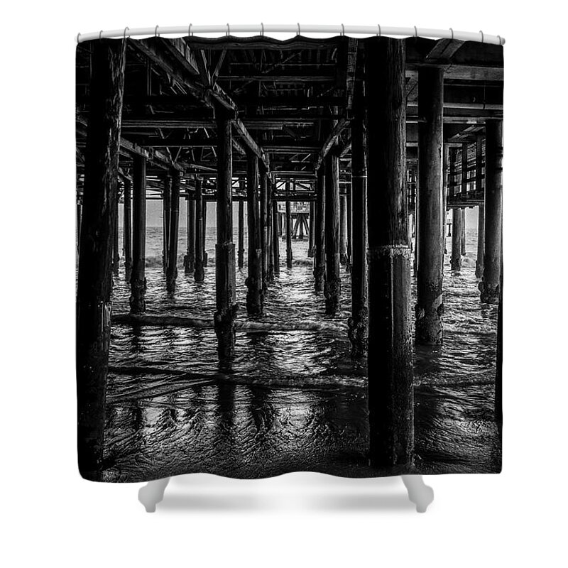 Under The Pier Shower Curtain featuring the photograph Under The Pier - Black And White by Gene Parks