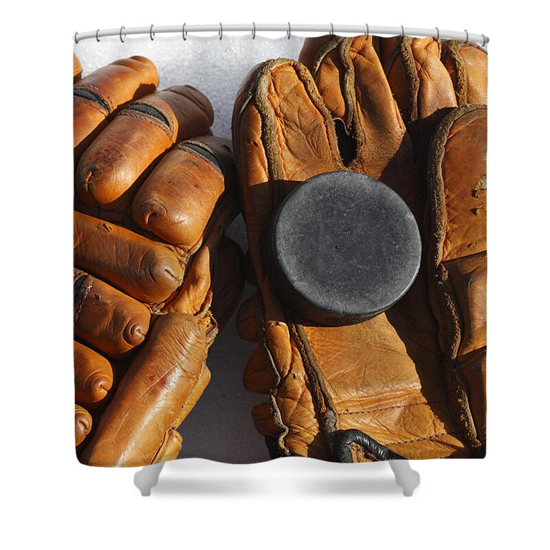 Sport Shower Curtain featuring the photograph Vintage ice hockey gloves and puck by Ulrich Kunst And Bettina Scheidulin