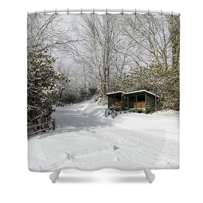 Snow Shower Curtain featuring the photograph Wagon Wheels and Firewood by D K Wall