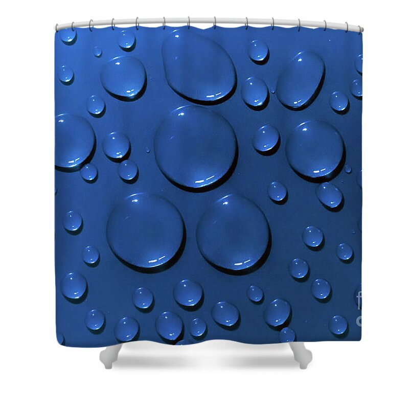 Water Shower Curtain featuring the photograph Water drops pattern on blue background by Simon Bratt