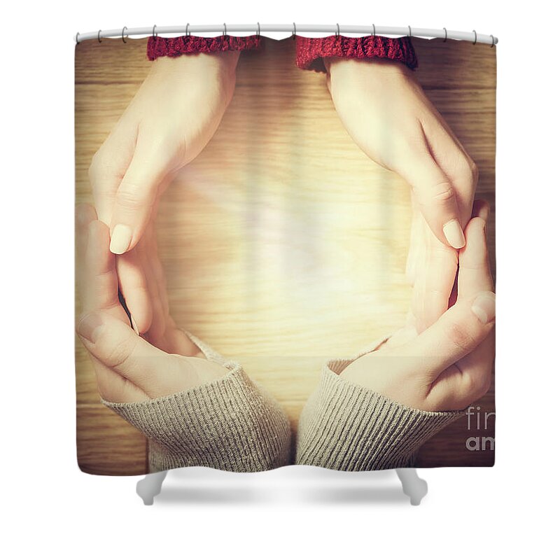 Hands Shower Curtain featuring the photograph Woman and man making circle with hands. Warm light inside by Michal Bednarek