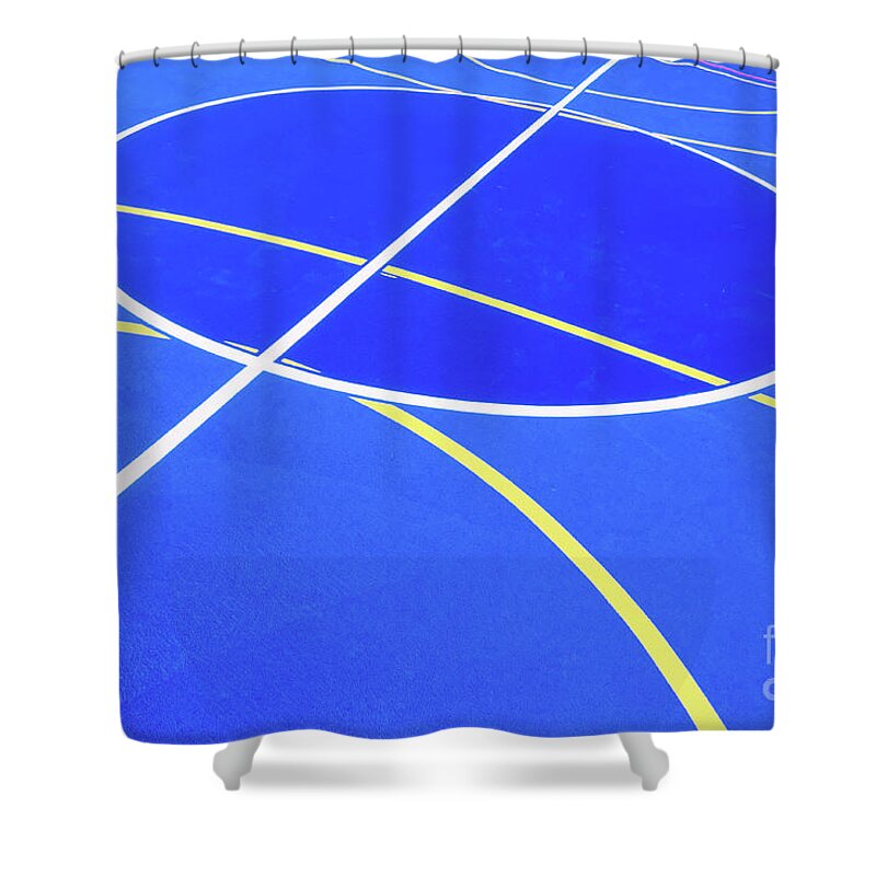 Abstract Shower Curtain featuring the photograph Design of a sports field, with blue background and red and yellow white lines creating strange straight lines and curves, to use with copy space. #1 by Joaquin Corbalan