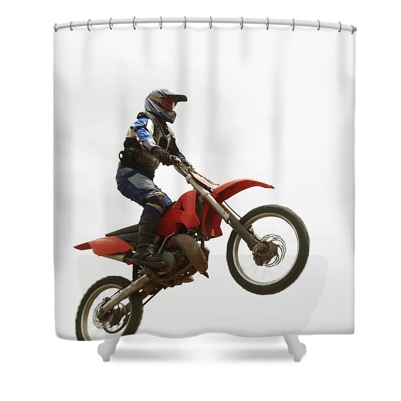 Crash Helmet Shower Curtain featuring the photograph Low Angle View Of A Motocross Rider #1 by Glowimages