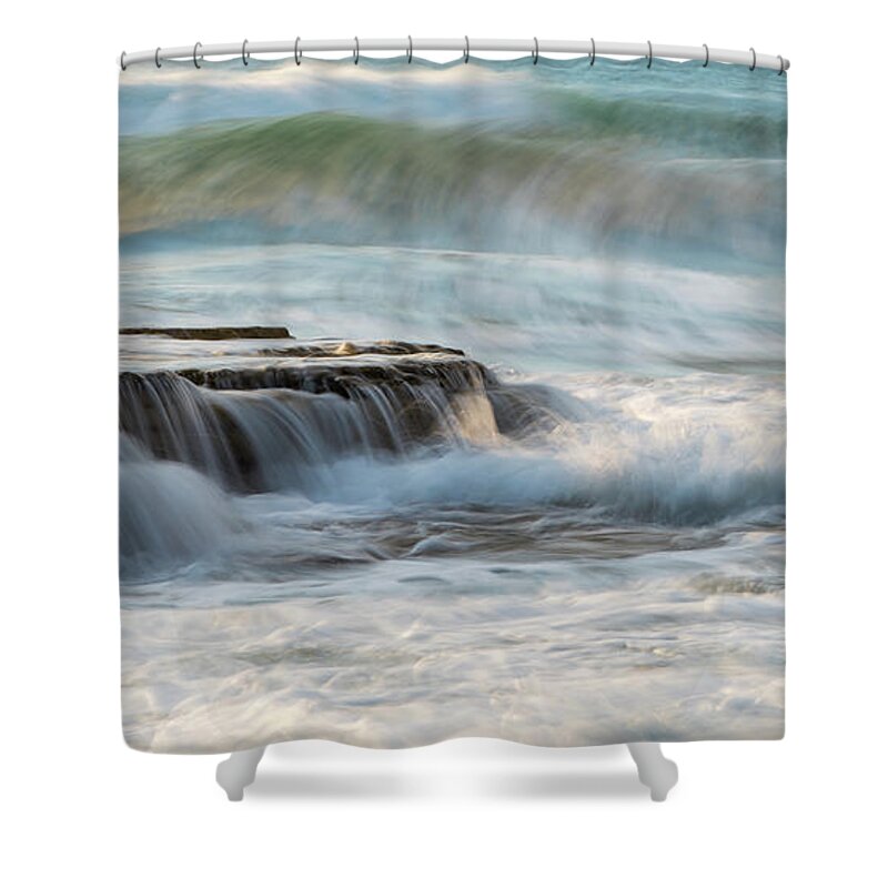 Seascape Shower Curtain featuring the photograph Rocky seashore with wavy ocean and waves crashing on the rocks #1 by Michalakis Ppalis