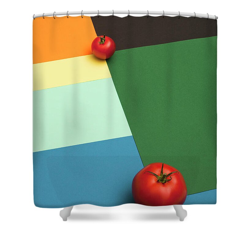 Part Of A Series Shower Curtain featuring the photograph A Large Tomato And A Small Tomato by Larry Washburn