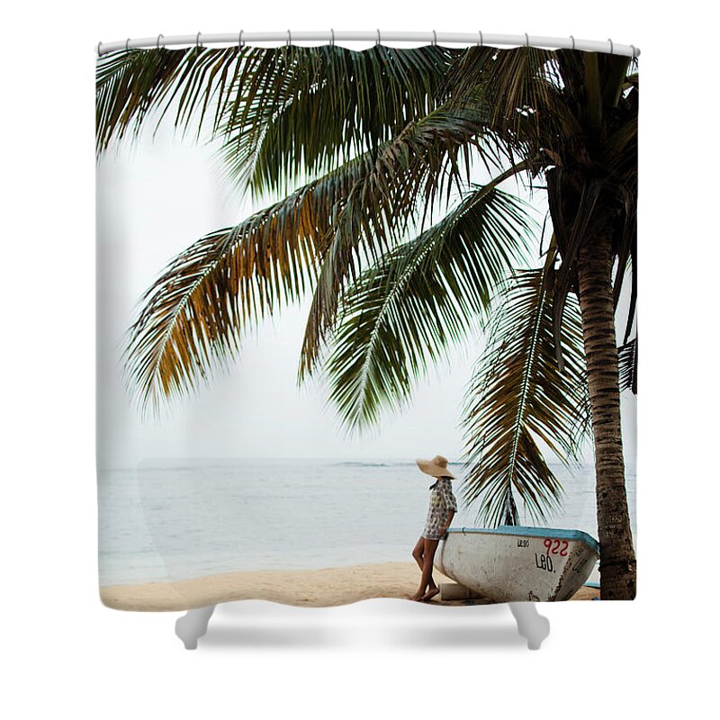 Scenics Shower Curtain featuring the photograph A Young Woman On A Secluded Beach On by Mint Images/ Michael Hanson