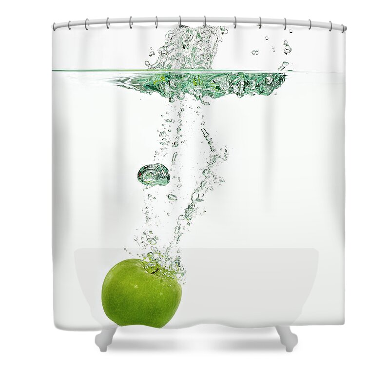 White Background Shower Curtain featuring the photograph Apple Dropping In Water by Mark Mawson