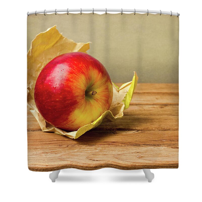 Wood Shower Curtain featuring the photograph Apple With Paper On Wooden Table by Copyright Anna Nemoy(xaomena)
