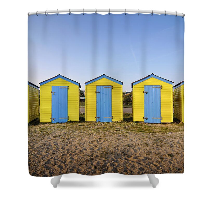 Tranquility Shower Curtain featuring the photograph Beach Huts by Photo © Stephen Chung