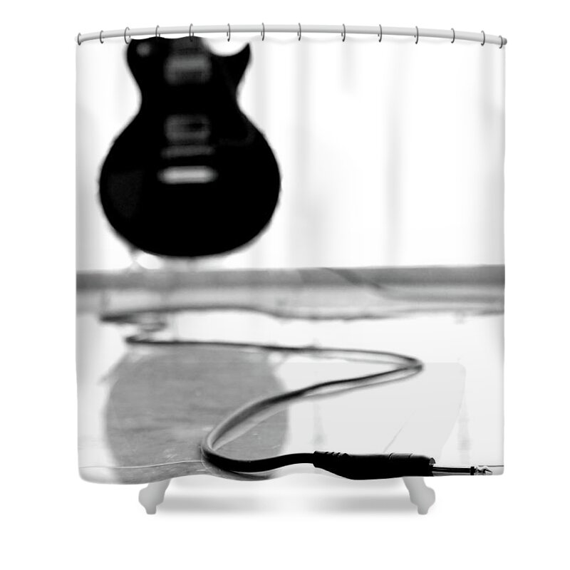 Rock Music Shower Curtain featuring the photograph Black Guitar And Cord With Copy Spapce by Clickhere