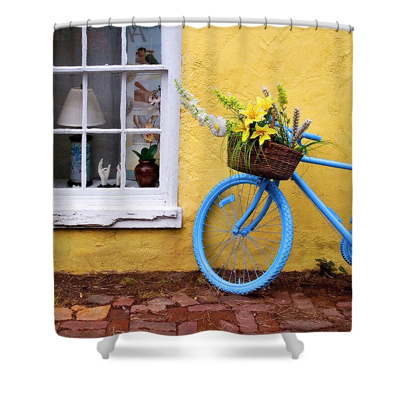 Outdoors Shower Curtain featuring the photograph Blue Bike Against Yellow Wall by Kevin B. Moore