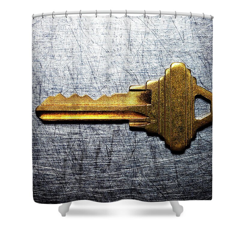 Security Shower Curtain featuring the photograph Brass Key On Stainless Steel by Ballyscanlon