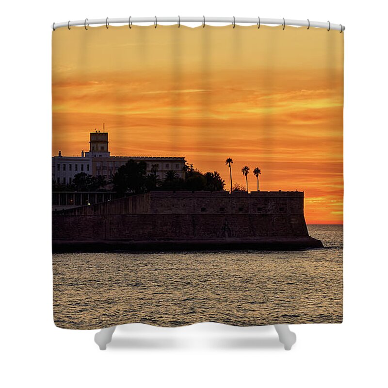 Andalusia Shower Curtain featuring the photograph Candelaria Fortress Silhouette at Sunset against Orange Sky by Pablo Avanzini